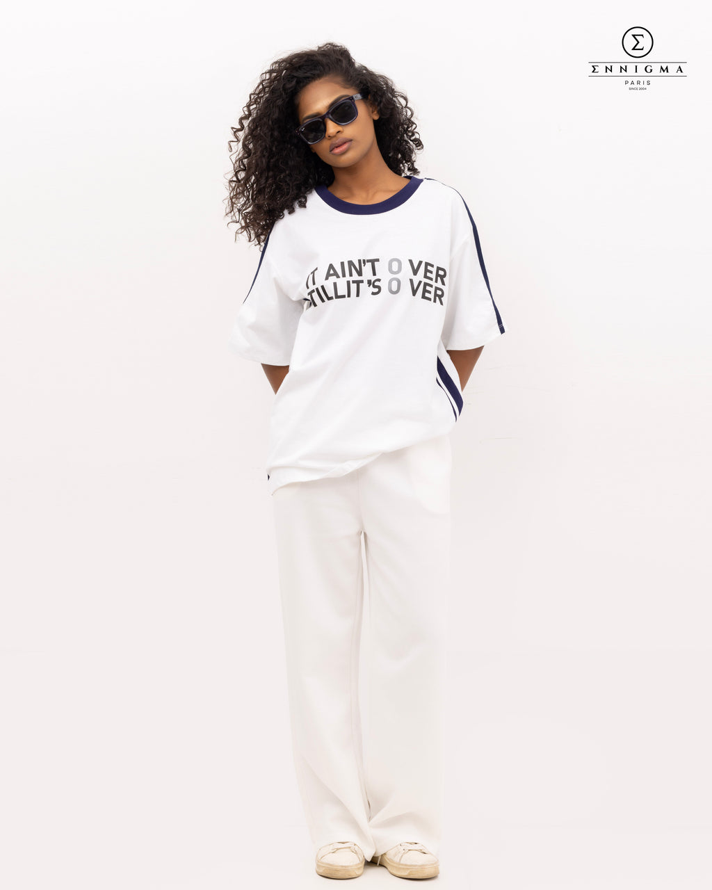 Varsity Slogan Oversized Tee – “It Ain’t Over” Edition