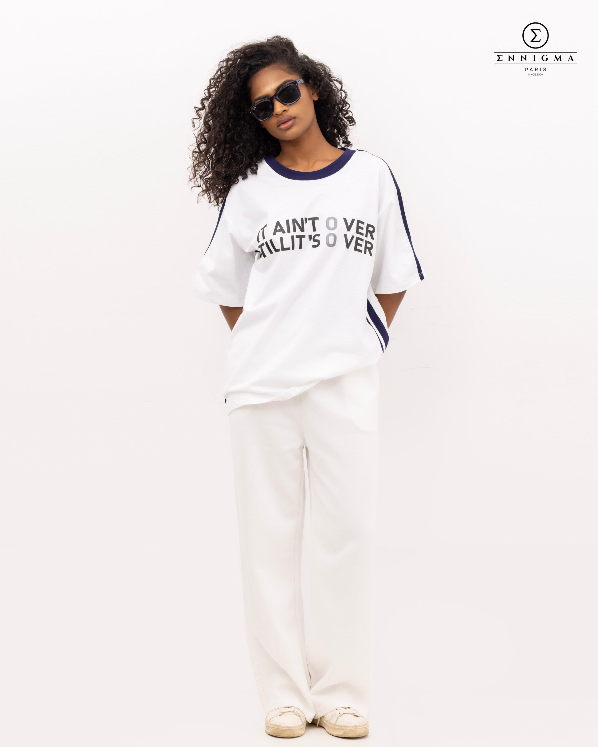 Varsity Slogan Oversized Tee – “It Ain’t Over” Edition