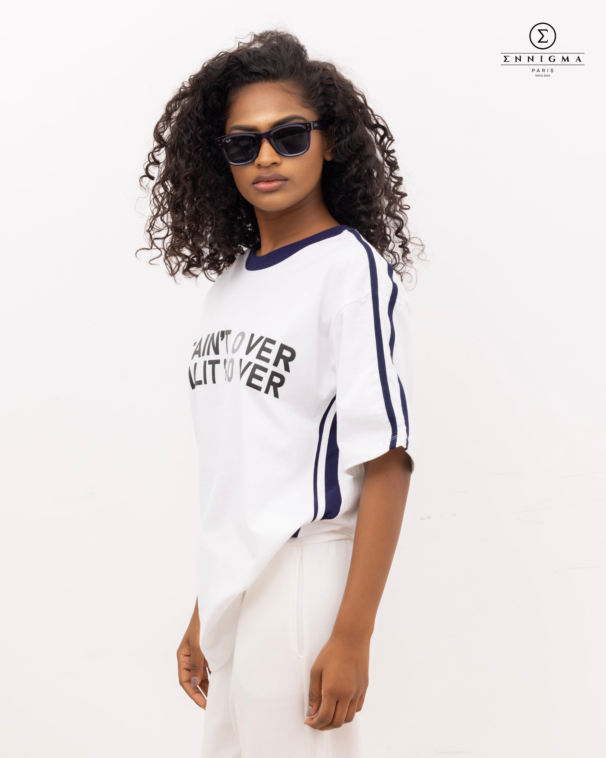 Varsity Slogan Oversized Tee – “It Ain’t Over” Edition
